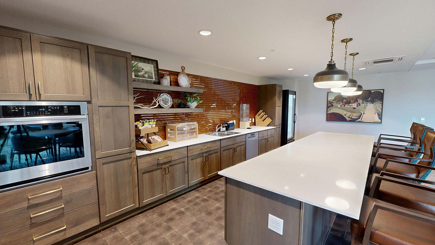 Bistro area at Aura Independent Living, featuring modern decor and soft lighting.